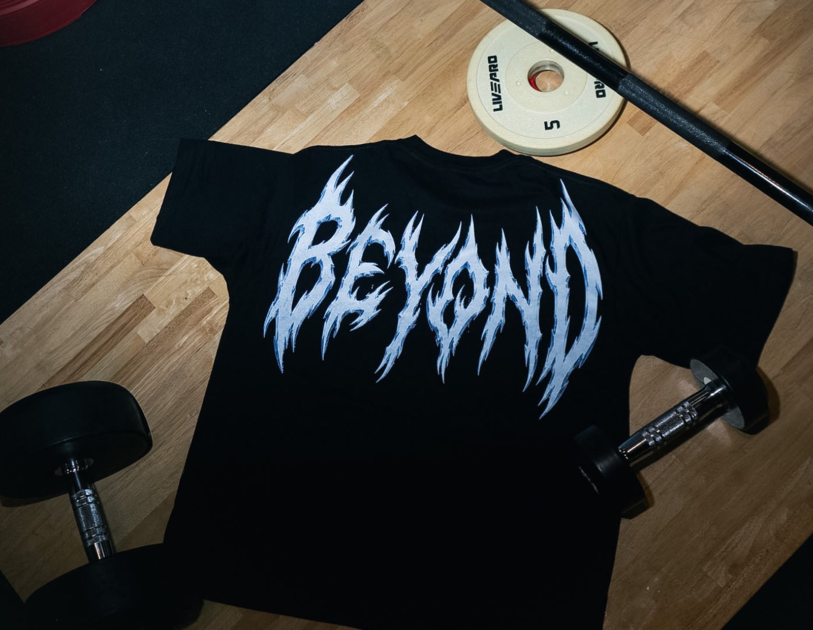Black Iron tee on the gym floor