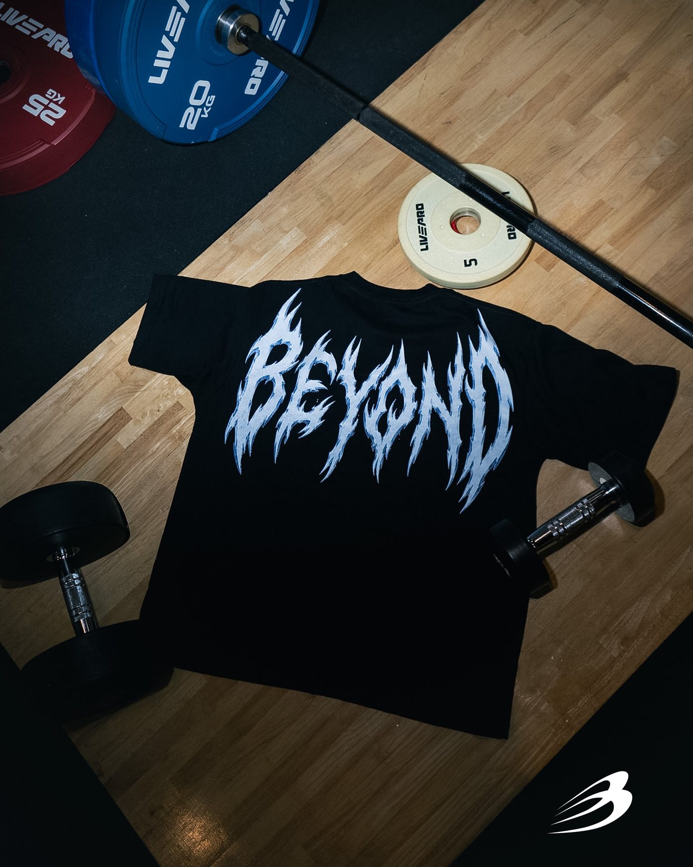 Black Iron tee on the gym floor, back print