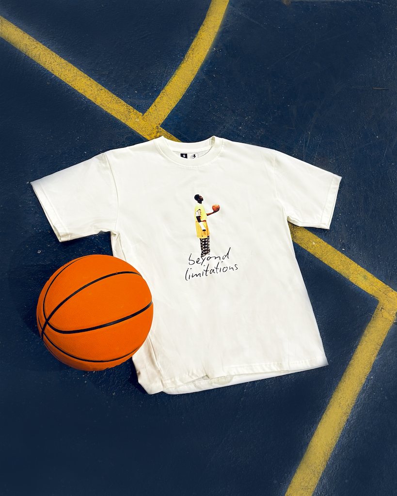 Kobe tee on the court with a basketball