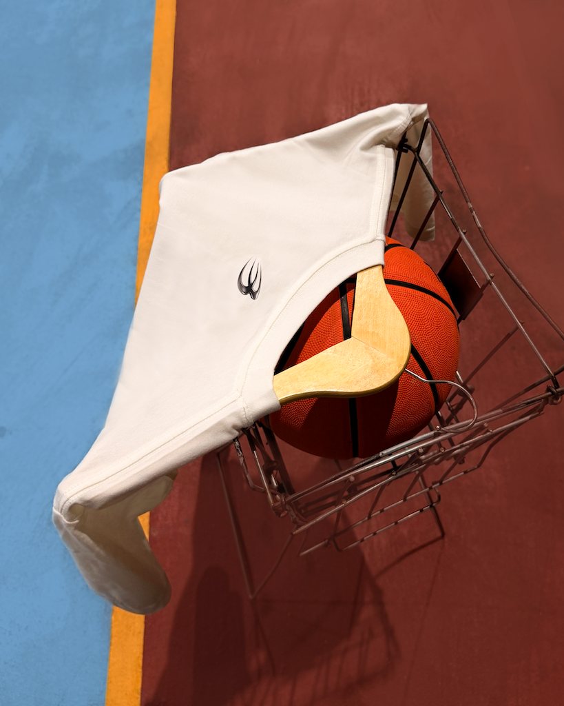 Kobe tee on a court hoop